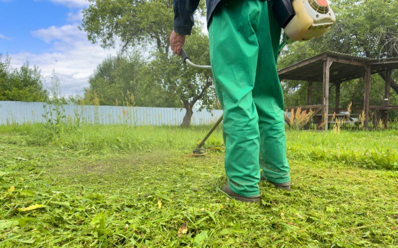 weed eating and grass trimming