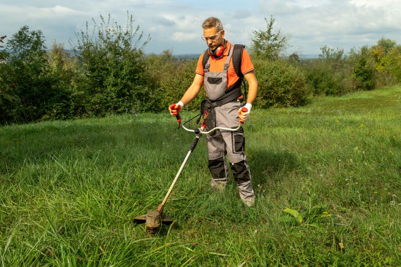 weed eating and grass trimming